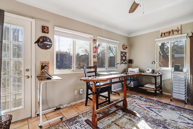 tiled office space with ceiling fan