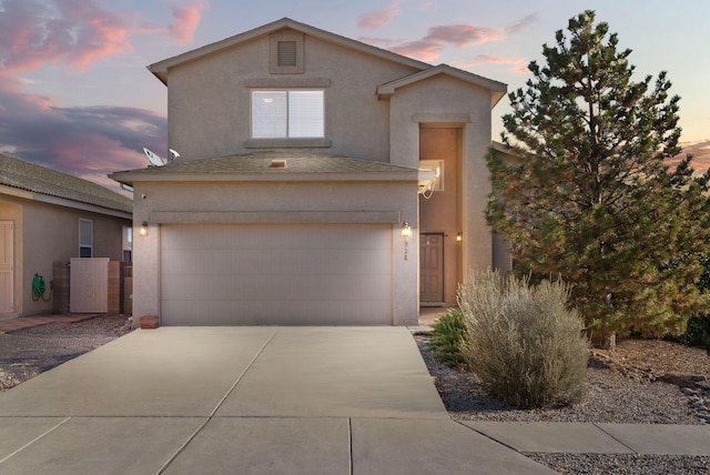 view of front of house with a garage