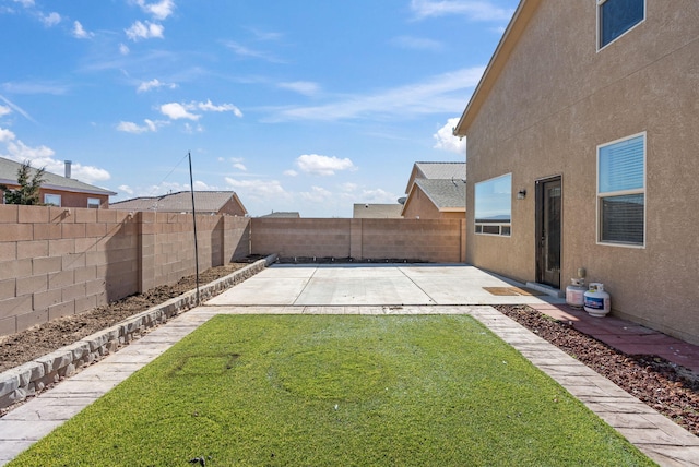 view of yard with a patio area