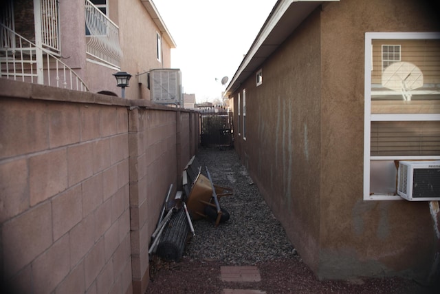 view of home's exterior featuring cooling unit