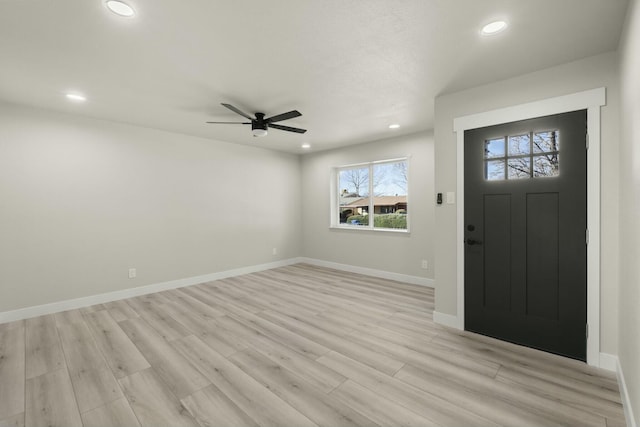 entryway featuring ceiling fan and light wood-type flooring