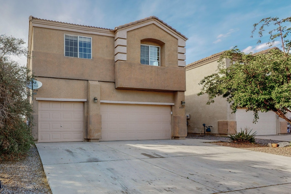 view of front of property featuring a garage