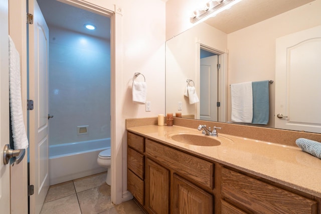 full bathroom featuring tile patterned flooring, vanity, toilet, and shower / washtub combination