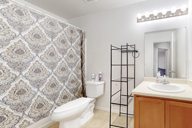 full bathroom with shower / tub combo with curtain, vanity, a textured ceiling, tile patterned floors, and toilet