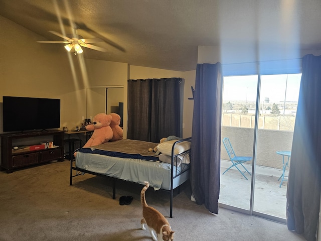 carpeted bedroom with access to outside and ceiling fan