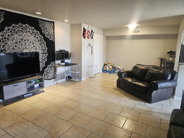 living room with a textured ceiling