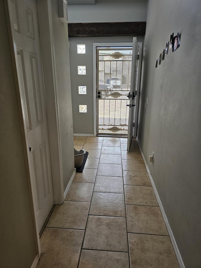 entryway featuring light tile patterned flooring