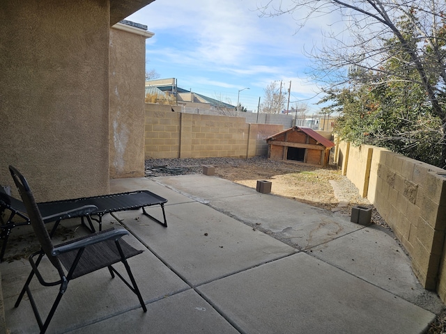 view of patio / terrace with an outdoor structure