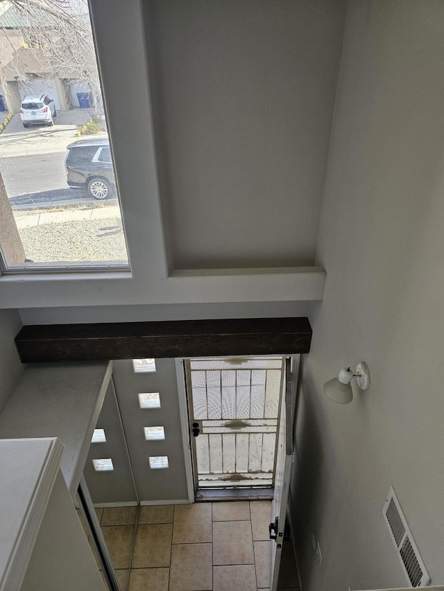 view of tiled foyer entrance