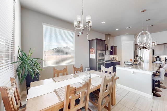 dining room with an inviting chandelier