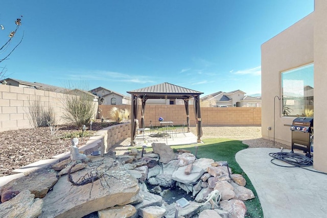 view of patio with a gazebo and grilling area