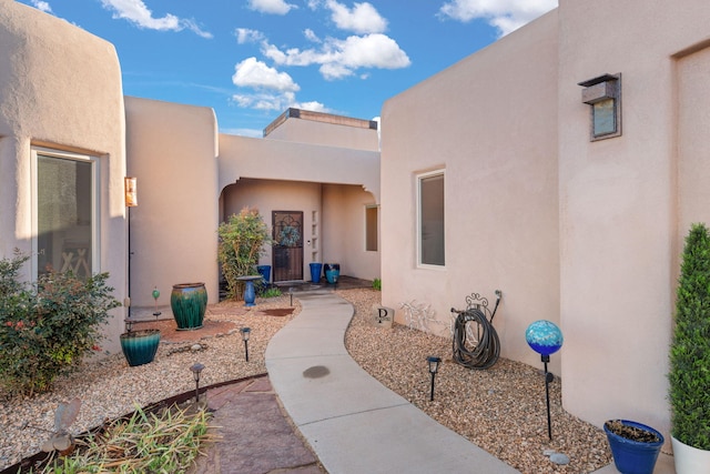 exterior space with stucco siding