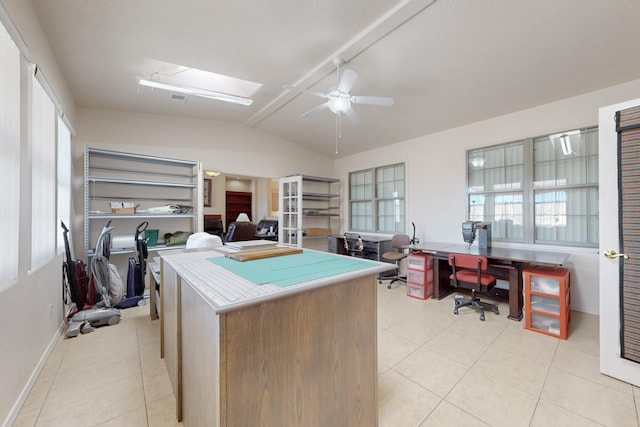 interior space featuring vaulted ceiling and ceiling fan