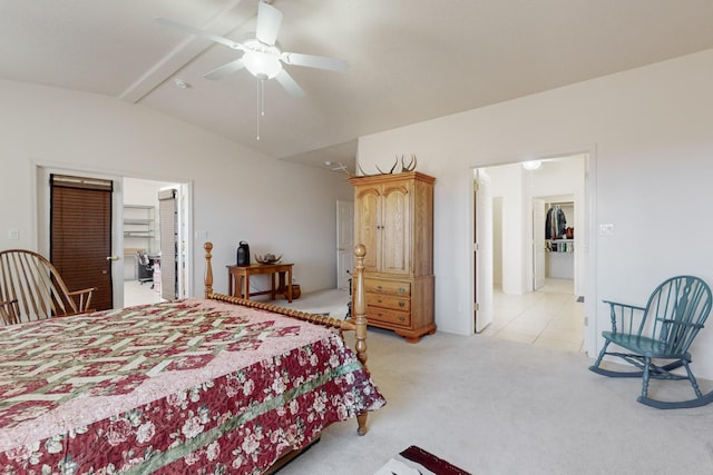 carpeted bedroom featuring lofted ceiling and ceiling fan