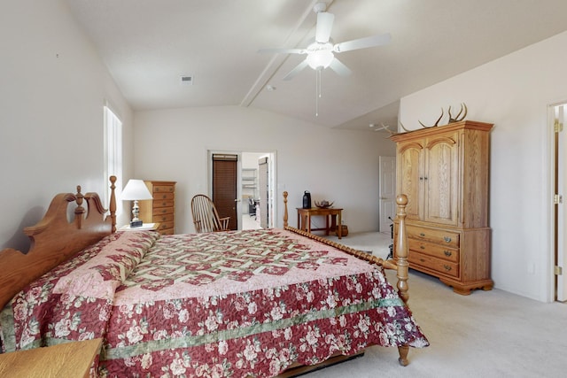 carpeted bedroom with vaulted ceiling with beams and ceiling fan