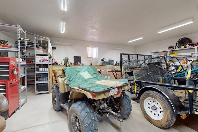 garage featuring a workshop area