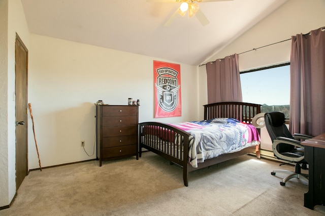 bedroom with ceiling fan, light colored carpet, and vaulted ceiling