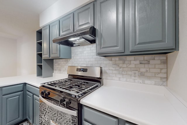 kitchen with backsplash and stainless steel gas range