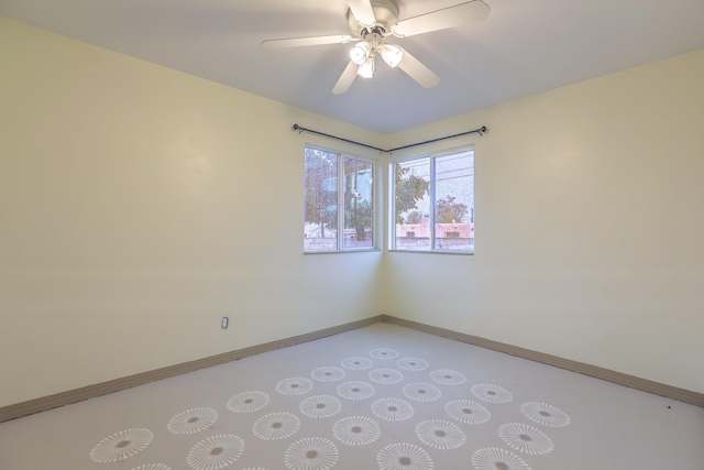 unfurnished room with ceiling fan