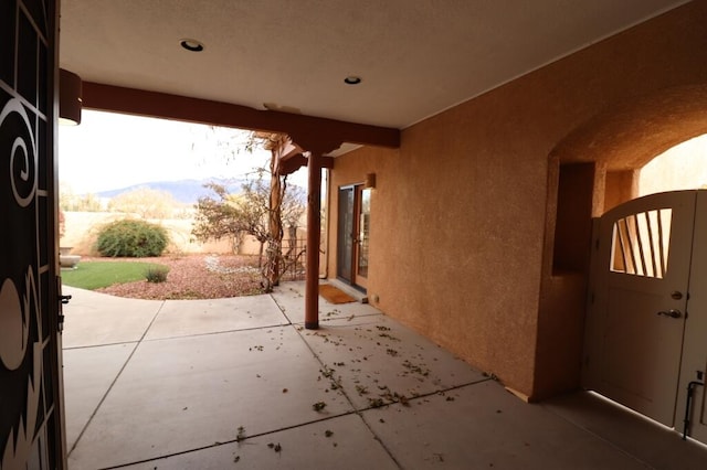 view of patio featuring a mountain view