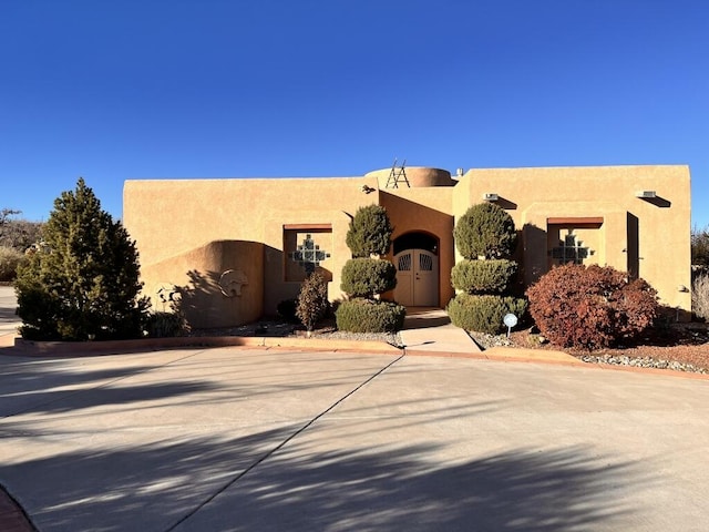 view of pueblo revival-style home