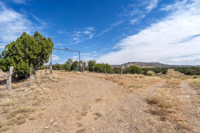 exterior space with a mountain view and a rural view