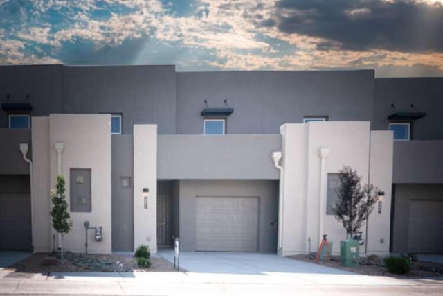 view of front of property with a garage