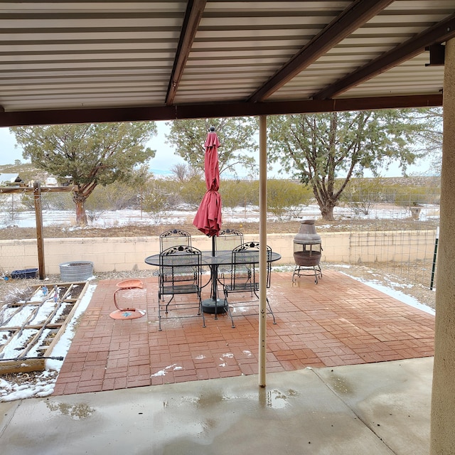 view of snow covered patio