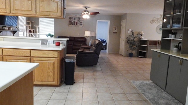 kitchen featuring ceiling fan and light tile patterned floors