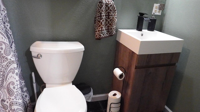 bathroom with sink and toilet