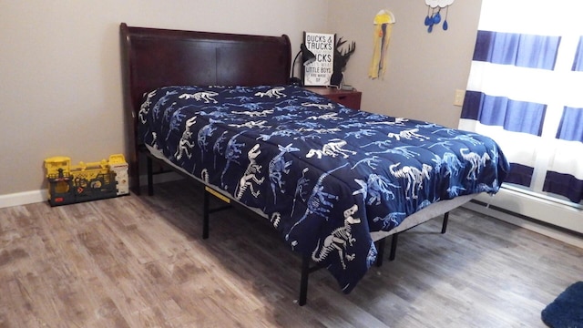 bedroom featuring hardwood / wood-style floors