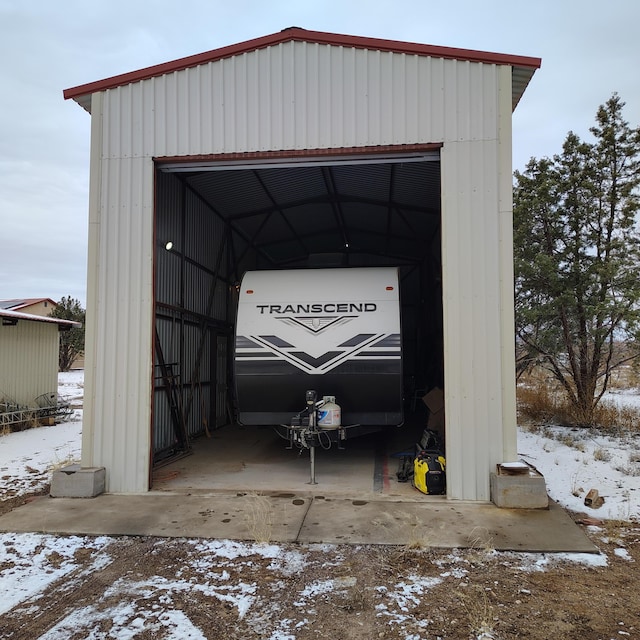 view of snow covered garage