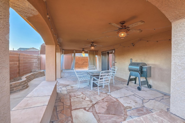 view of patio featuring ceiling fan and area for grilling