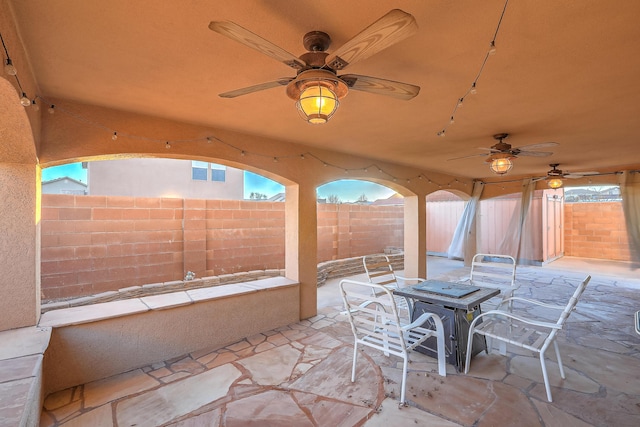 view of patio / terrace featuring ceiling fan