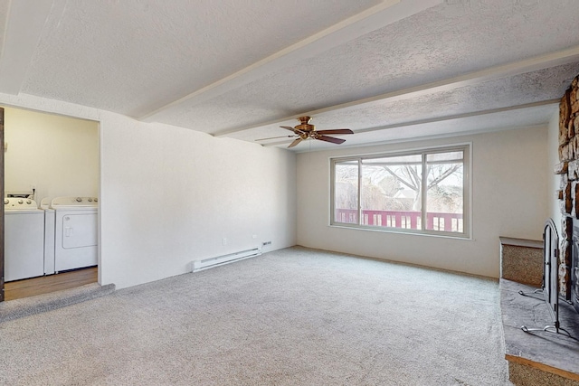 unfurnished living room featuring light carpet, ceiling fan, independent washer and dryer, a textured ceiling, and a baseboard radiator