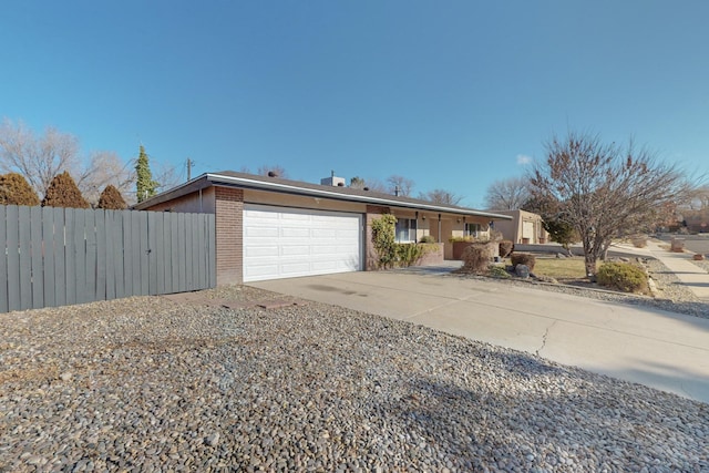 single story home with a garage