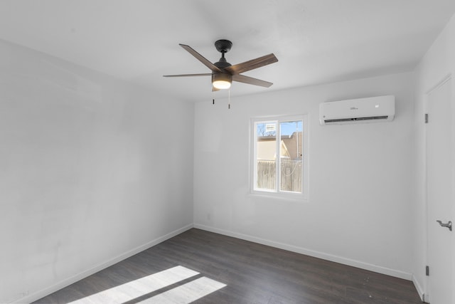 unfurnished room featuring dark hardwood / wood-style floors, ceiling fan, and a wall unit AC