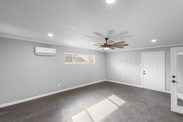 unfurnished room with a wall mounted air conditioner, ceiling fan, ornamental molding, and a textured ceiling