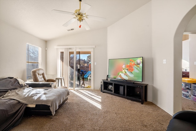 bedroom featuring visible vents, arched walkways, carpet, access to outside, and vaulted ceiling