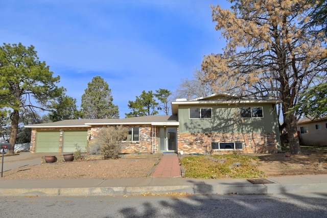 split level home featuring a garage