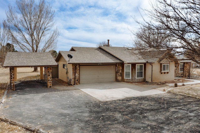 ranch-style house featuring a garage