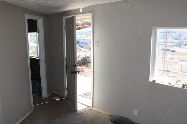 entrance foyer with a textured wall