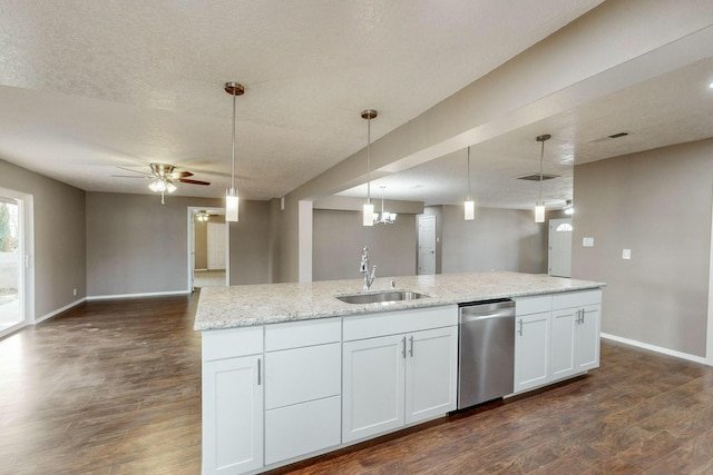 kitchen with light stone countertops, stainless steel dishwasher, sink, white cabinets, and hanging light fixtures