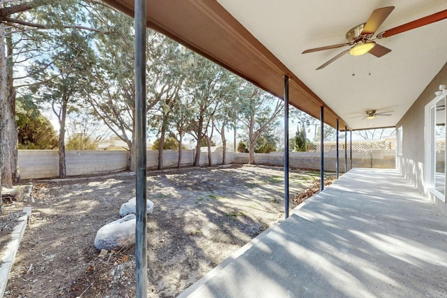 view of patio featuring ceiling fan