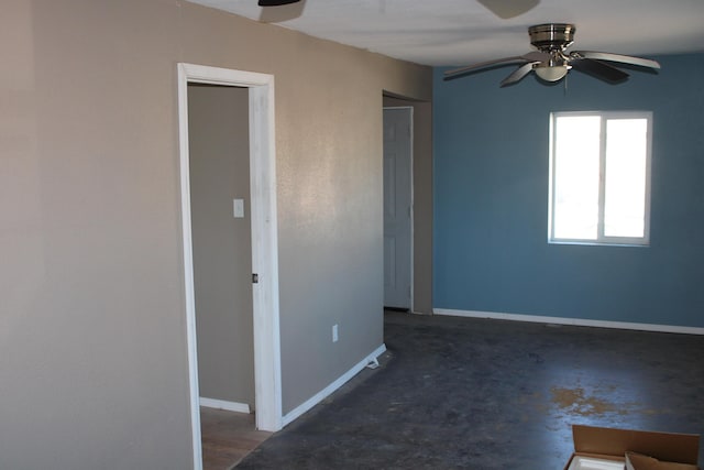 empty room featuring ceiling fan