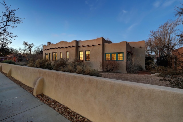 view of pueblo revival-style home