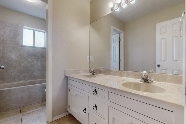 bathroom with tile patterned floors and vanity