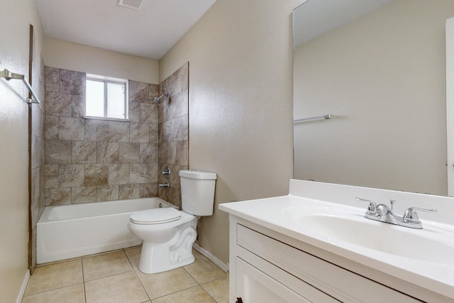 full bathroom featuring tile patterned flooring, vanity, toilet, and tiled shower / bath