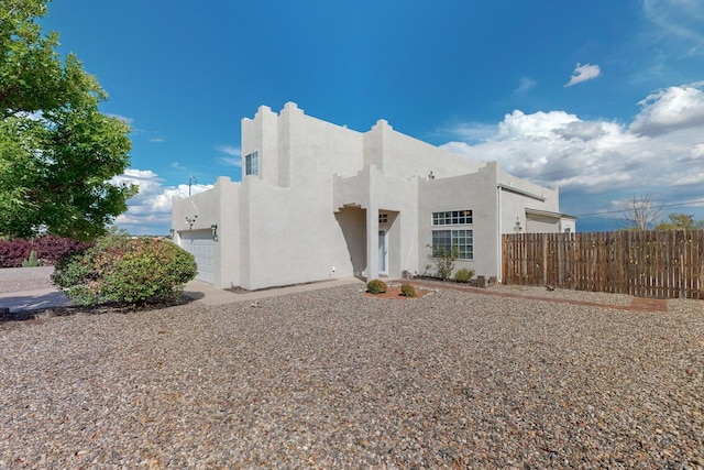 adobe home with a garage