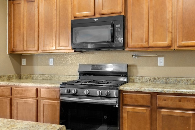 kitchen featuring stainless steel gas stove